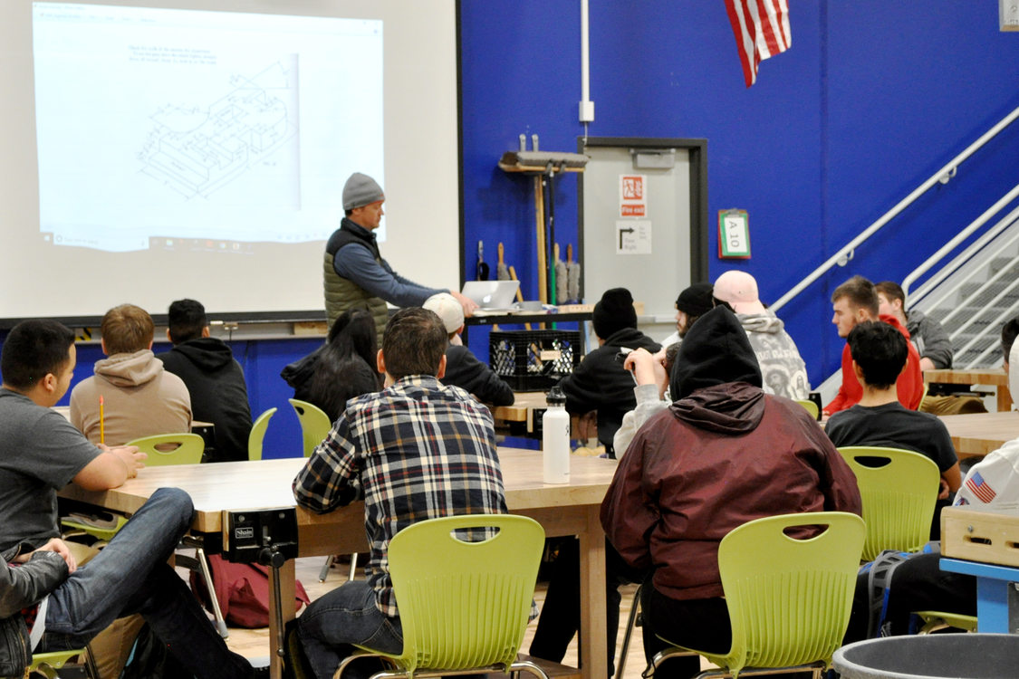 construction teacher teaching at beaverton high wood shop