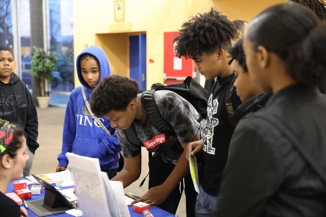 students signing up at SEI trades fair