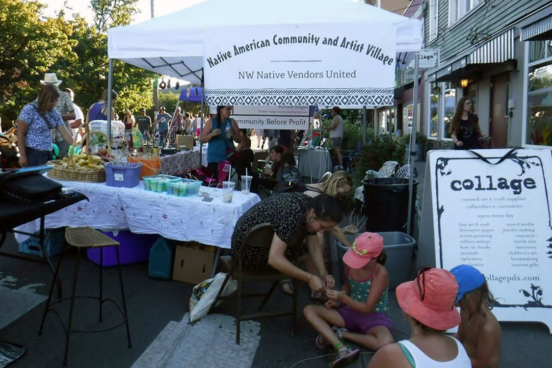 an outdoor market with vendors