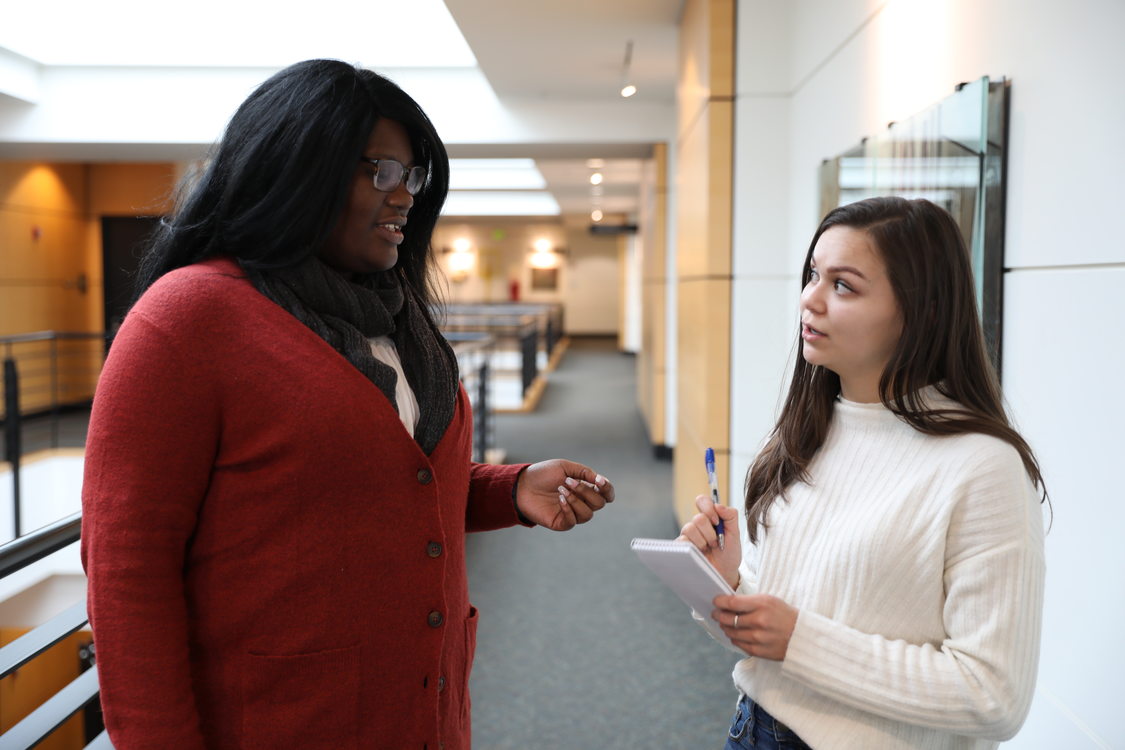 woman interviewing another woman at Metro Regional Center