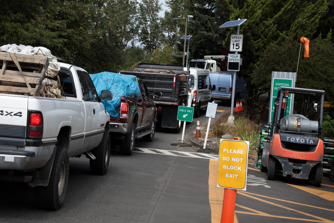 vehicles line up at Metro south transfer stationfor a turn at dumping off things they no longer need