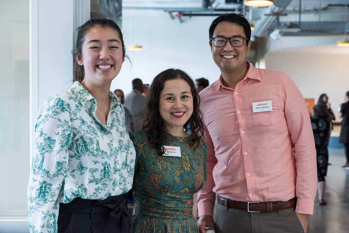 Metro Councilor Duncan Hwang stands alongside two women at the APANO ribbon cutting ceremony in 2019