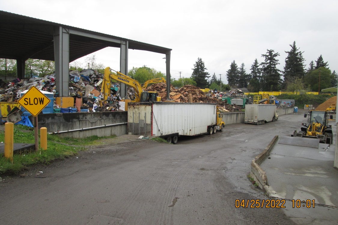 Outside image of Environmentally Conscious Recycling, Inc. facility.