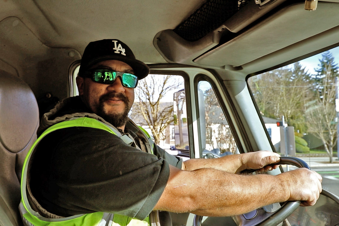 Jay, a Community Beautification Lead for Cultivate Initiatives, drives his truck Brutus.