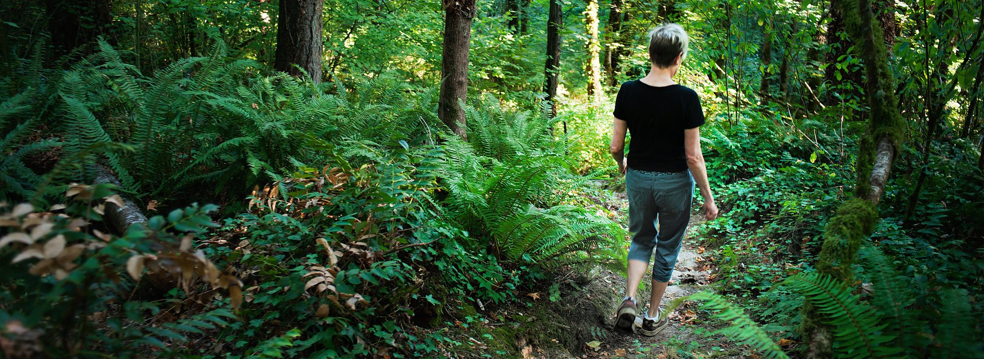 photo of woman walking at Newell Creek Canyon