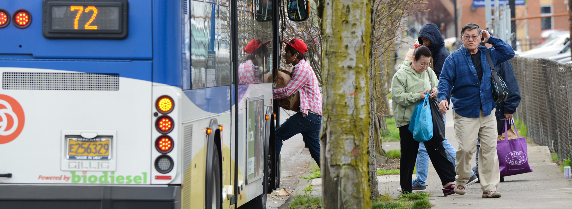 People getting off the 72 bus