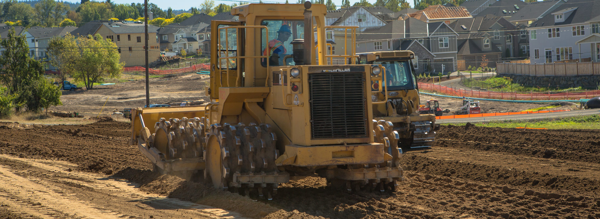 North Bethany tractor and homes under construction