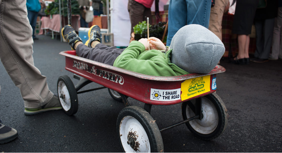 photo of kid at farmers market