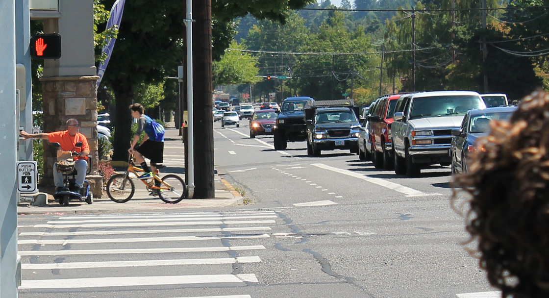 Waiting to cross at 182nd and Division