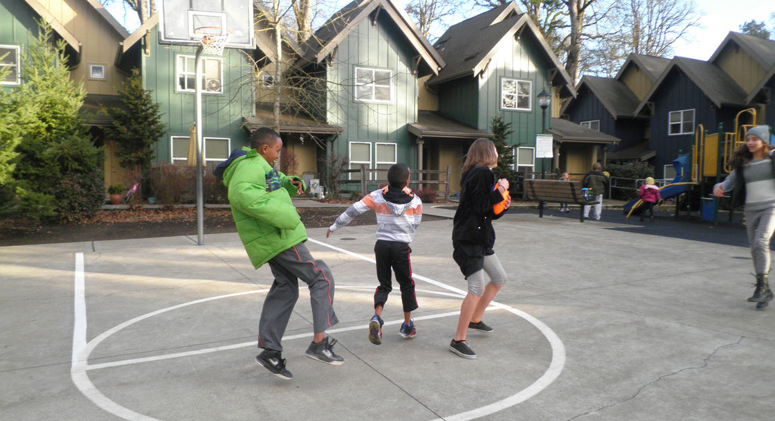 kids playing at Oleson Woods apartment complex