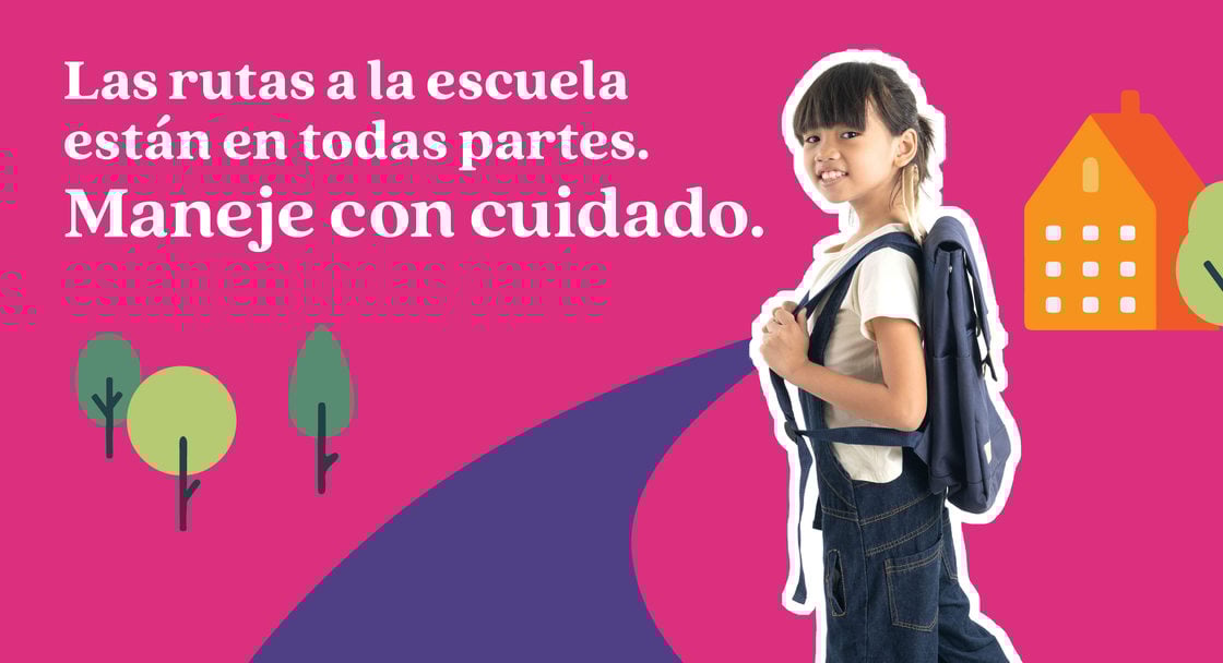 Safety campaign poster with text saying "School routes are everywhere. Drive like it" in Spanish. A child is wearing a backpack and carrying a folder with an animated background